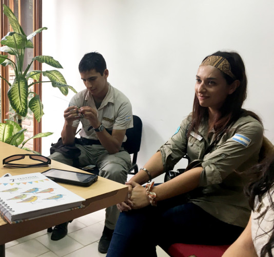 Sebastián Ortega takes a closer look at the satellite tag, with Paula Martínez enjoying the discussion.